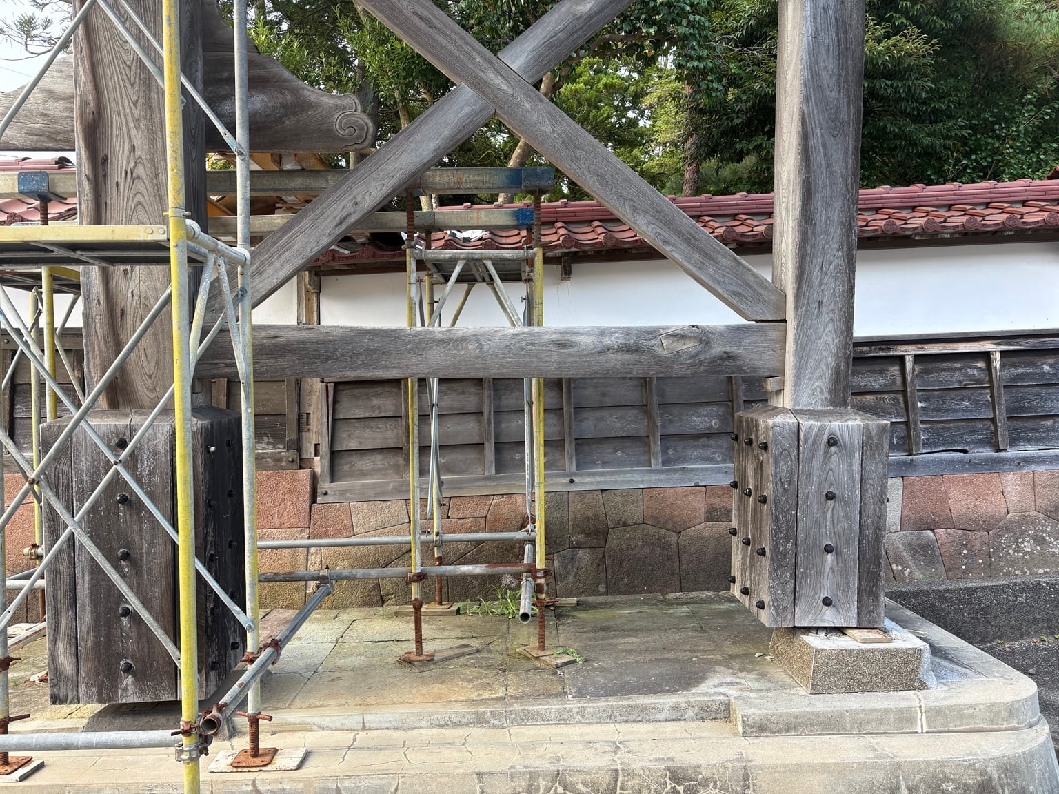 Timber structure under repair at Sojiji Soin, with scaffolding around the column bases